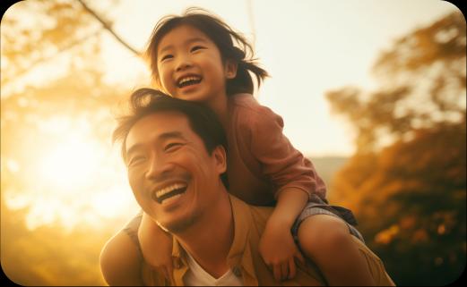 Dad giving a piggyback to his daughter